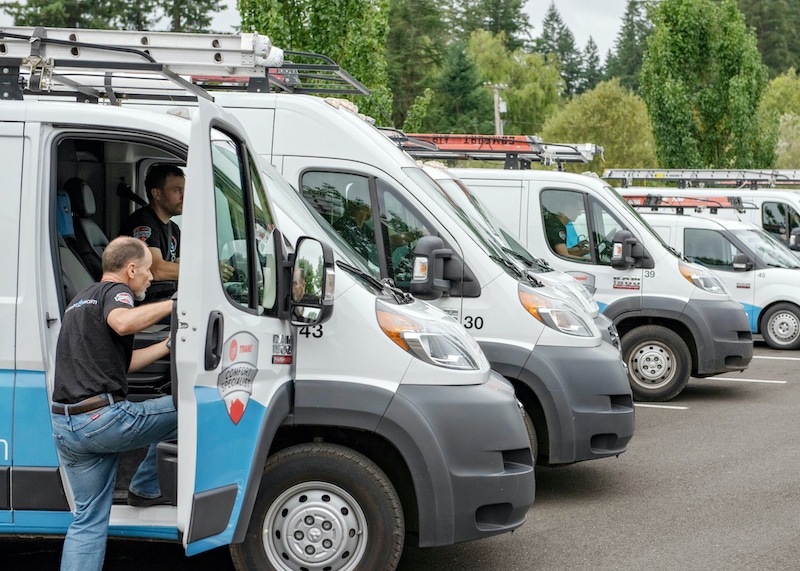 Work trucks lined up for workers