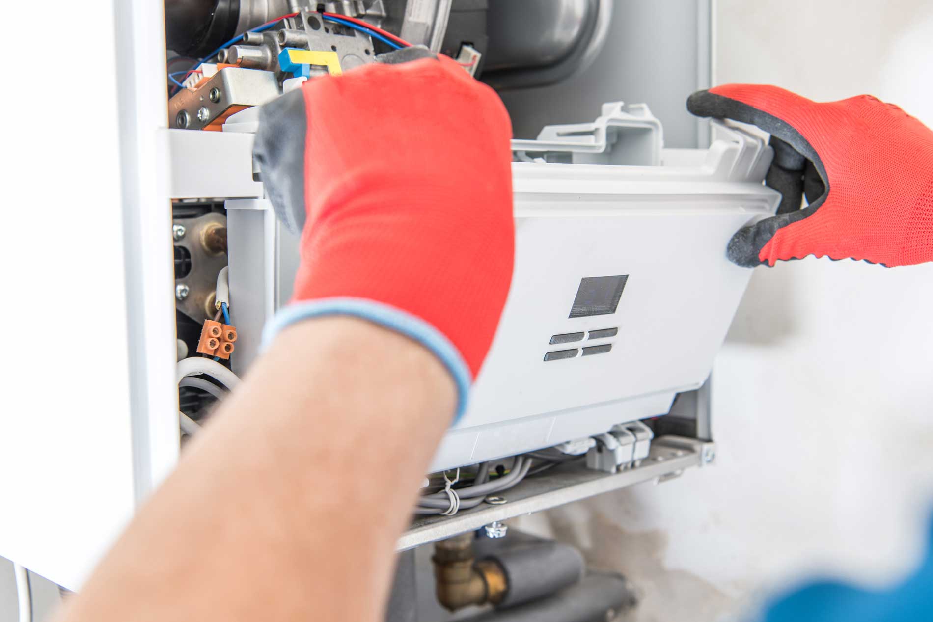 HeatingRepair_Frunace Comfort 360 tech helping with a repair