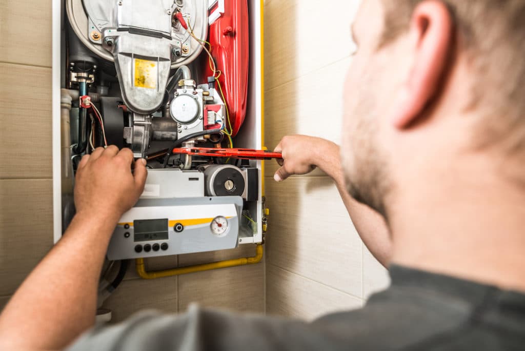 Comfort 360 HVAC technician performing furnace installation