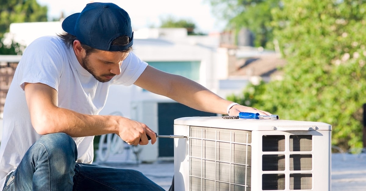 Homeowner attempting Air Conditioner Repair